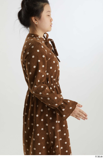 Aera  1 arm brown dots dress casual dressed flexing…